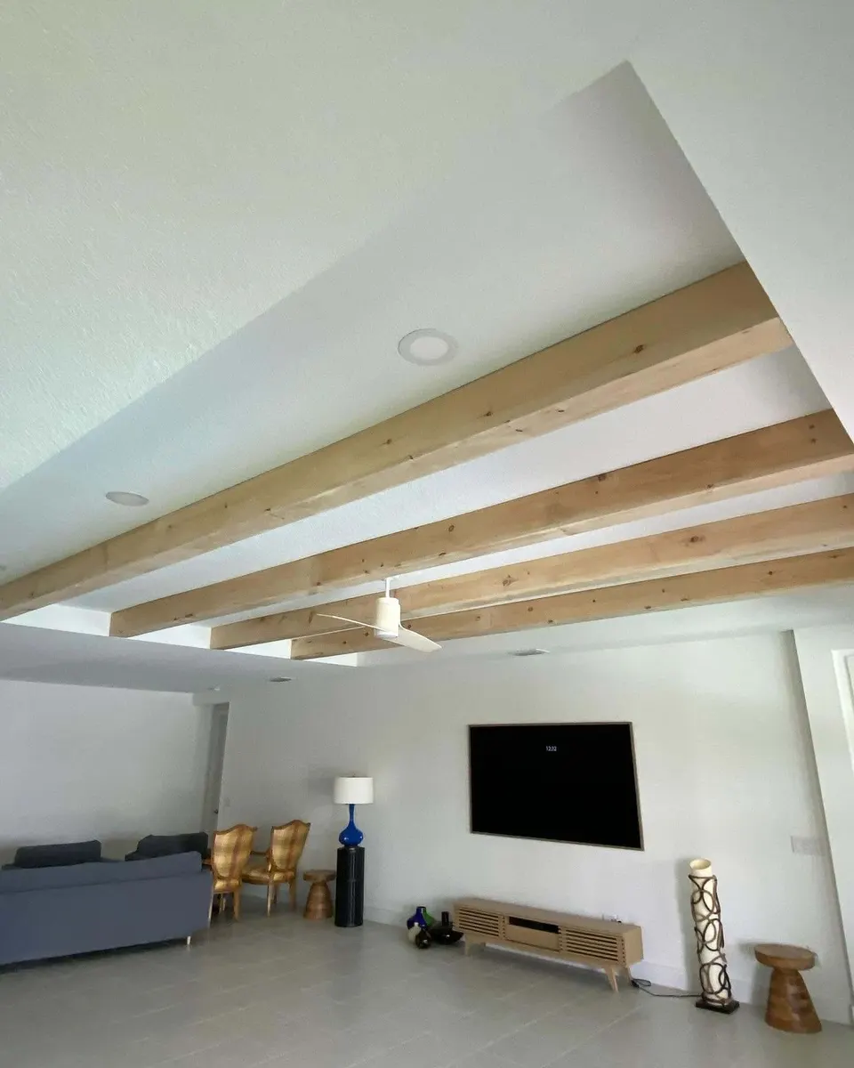 Exposed wood ceiling beams in a living room